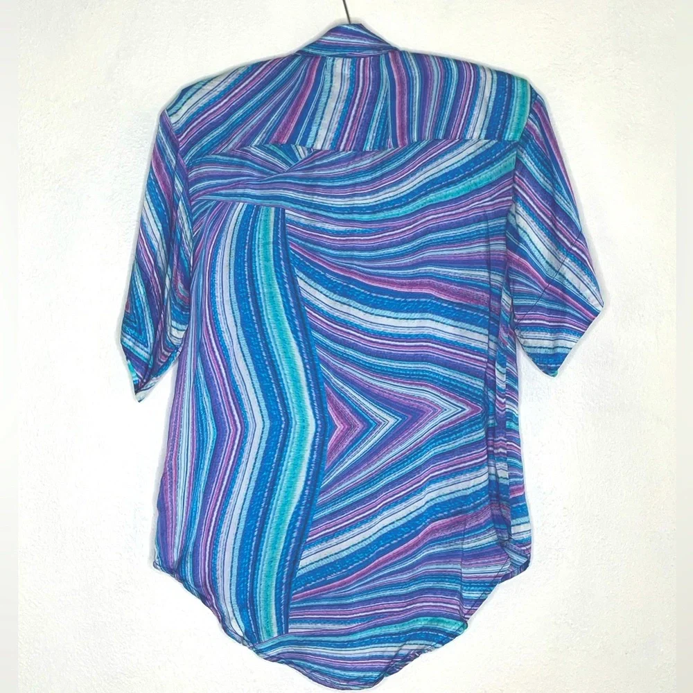 Frankie’s Bikinis Fifi Sustainable blue purple swirl cover up shirt. Size XS